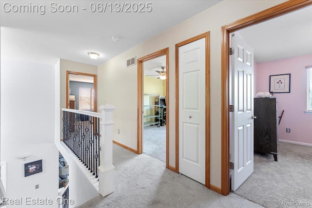 26957 Blue Heron Dr, Flat Rock, MI 48134 - hallway featuring an upstairs landing and carpet floors