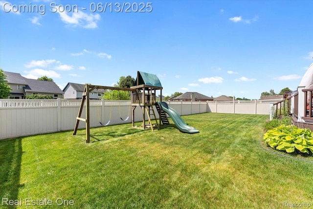 26957 Blue Heron Dr, Flat Rock, MI 48134 - fenced backyard featuring a playground