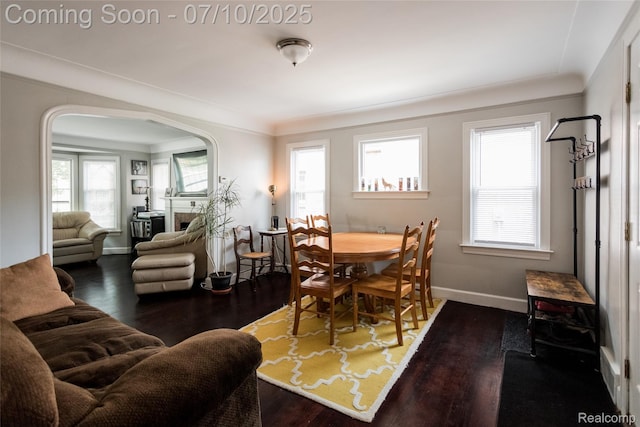 3924 Yorkshire Rd, Detroit, MI 48224 - dining room with wood finished floors and arched walkways