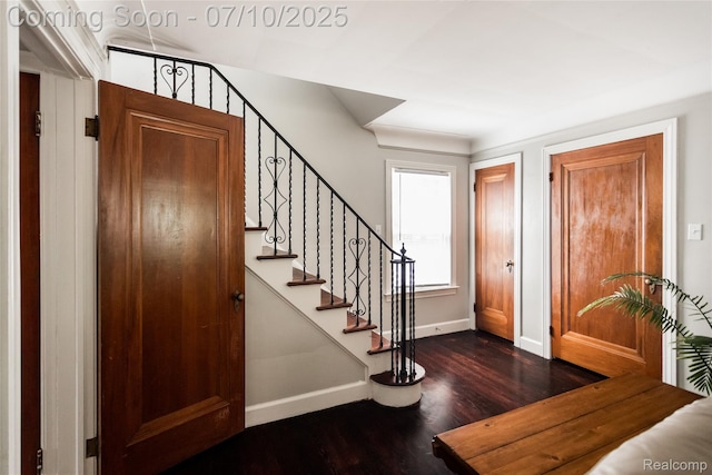3924 Yorkshire Rd, Detroit, MI 48224 - foyer entrance featuring dark wood finished floors and stairway
