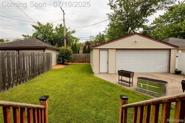 3924 Yorkshire Rd, Detroit, MI 48224 - fenced backyard featuring an outdoor structure and a garage
