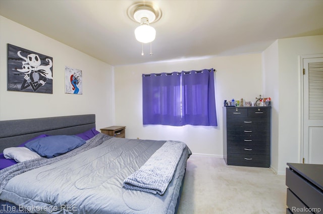 1038 Cora Dr, Flint, MI 48532 - bedroom featuring carpet flooring and baseboards
