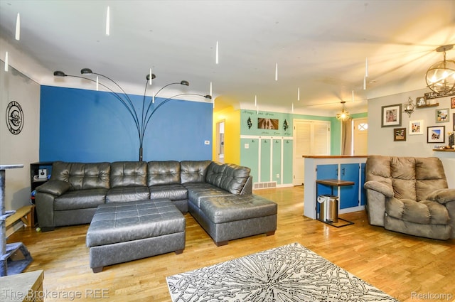 1038 Cora Dr, Flint, MI 48532 - living room featuring light wood-style flooring