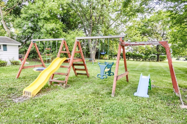 1038 Cora Dr, Flint, MI 48532 - view of playground featuring a yard