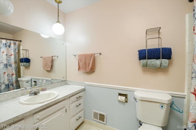 1038 Cora Dr, Flint, MI 48532 - full bath with vanity and a shower with curtain