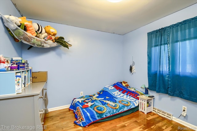 1038 Cora Dr, Flint, MI 48532 - bedroom featuring light wood-style floors