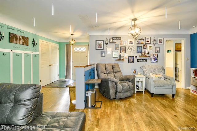 1038 Cora Dr, Flint, MI 48532 - living area featuring wood finished floors