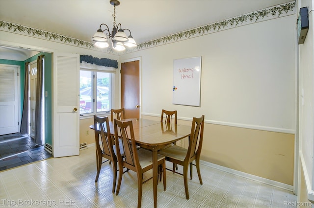 1038 Cora Dr, Flint, MI 48532 - dining area with a chandelier and baseboards