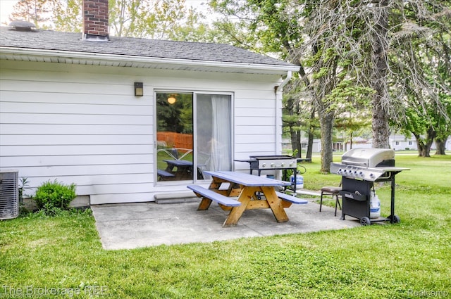 1038 Cora Dr, Flint, MI 48532 - view of patio / terrace featuring a grill