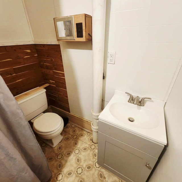 212 W Ash St, Albion, MI 49224 - bathroom featuring toilet and vanity