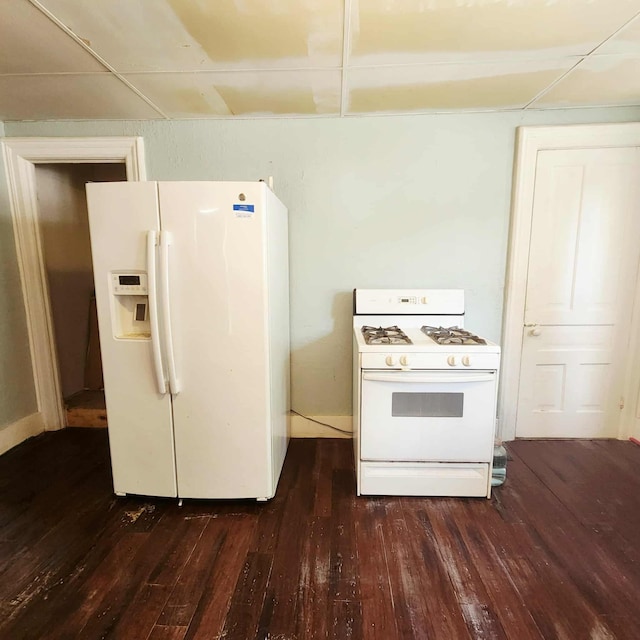 212 W Ash St, Albion, MI 49224 - kitchen with white appliances and dark wood-style flooring