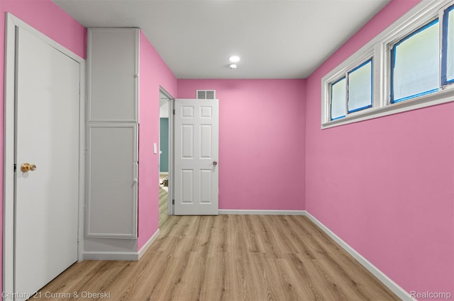 17295 Dora St, Melvindale, MI 48122 - unfurnished bedroom featuring wood finished floors and recessed lighting