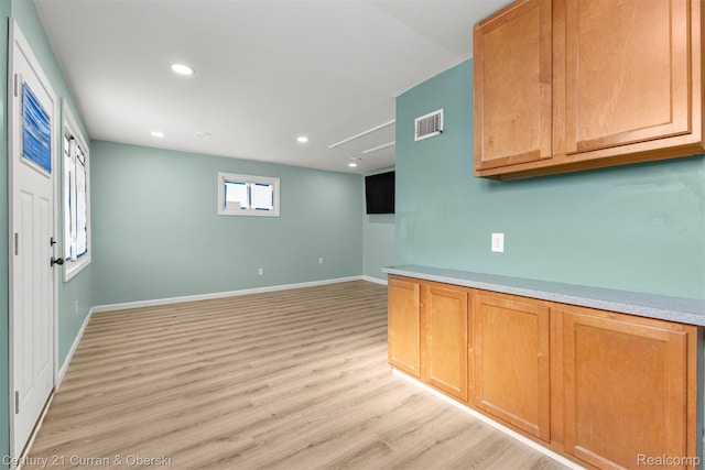 17295 Dora St, Melvindale, MI 48122 - kitchen featuring light wood-style floors, recessed lighting, and light countertops