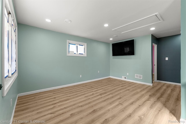 17295 Dora St, Melvindale, MI 48122 - unfurnished room featuring attic access, light wood-style floors, and recessed lighting