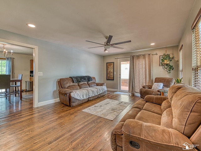 4775 Huron Ave, Newport, MI 48166 - living room with wood finished floors, a ceiling fan, a chandelier, and recessed lighting