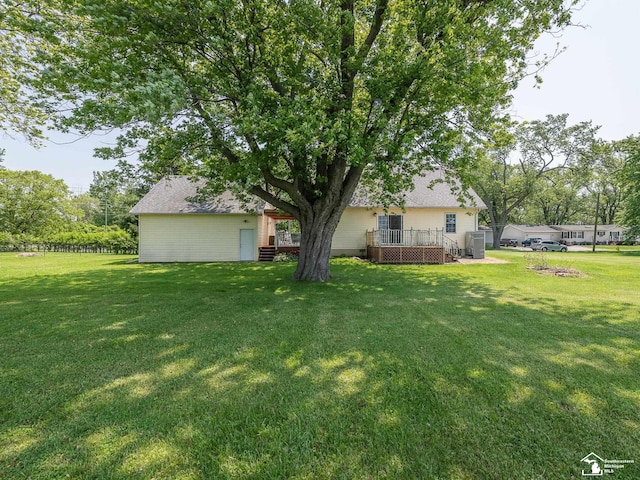 4775 Huron Ave, Newport, MI 48166 - view of grassy yard featuring a wooden deck