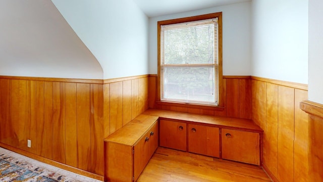 10 Covell Ave NW, Grand Rapids, MI 49504 - detailed view of a wainscoted wall, wood finished floors, and wooden walls