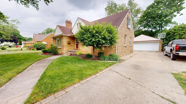 10 Covell Ave NW, Grand Rapids, MI 49504 - view of front of home featuring a detached garage, a front lawn, an outbuilding, brick siding, and a chimney