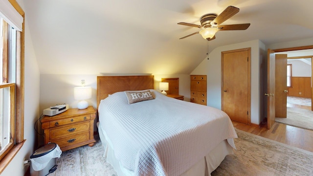 10 Covell Ave NW, Grand Rapids, MI 49504 - bedroom with light wood-style floors, lofted ceiling, and a ceiling fan