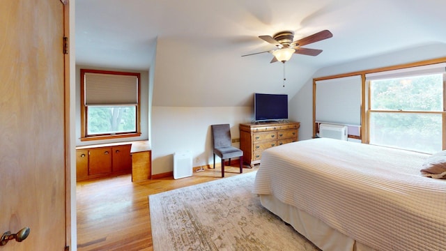 10 Covell Ave NW, Grand Rapids, MI 49504 - bedroom featuring light wood-type flooring, vaulted ceiling, and ceiling fan