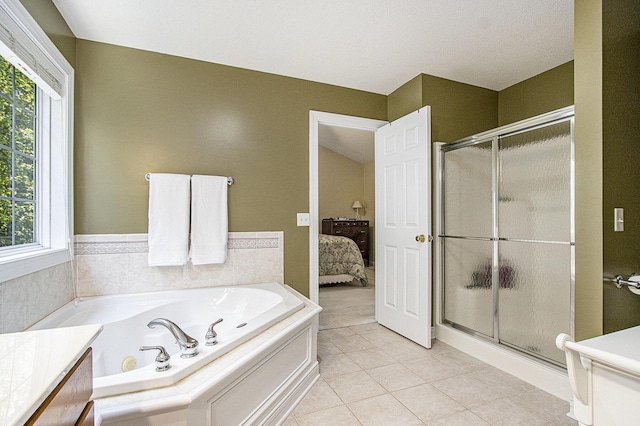 7853 Clydesdale Ave, Kalamazoo, MI 49009 - full bath featuring a shower stall, a whirlpool tub, and healthy amount of natural light