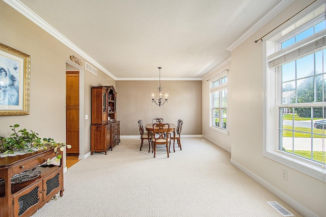 7853 Clydesdale Ave, Kalamazoo, MI 49009 - dining area with healthy amount of natural light, a chandelier, light colored carpet, crown molding, and a textured ceiling