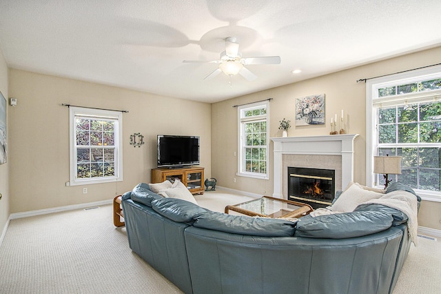 7853 Clydesdale Ave, Kalamazoo, MI 49009 - living area with carpet, a high end fireplace, and ceiling fan