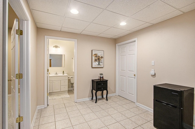 7853 Clydesdale Ave, Kalamazoo, MI 49009 - foyer entrance featuring a paneled ceiling, light tile patterned floors, and recessed lighting