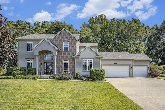 7853 Clydesdale Ave, Kalamazoo, MI 49009 - traditional-style home with driveway, a front yard, an attached garage, and roof with shingles