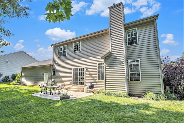 7853 Clydesdale Ave, Kalamazoo, MI 49009 - rear view of property featuring a lawn, a chimney, and a patio area