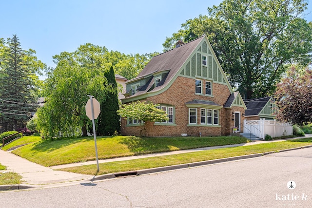 1002 Benjamin Ave SE, Grand Rapids, MI 49506 - view of front of house with a chimney and brick siding