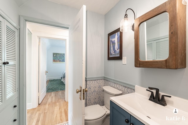 1002 Benjamin Ave SE, Grand Rapids, MI 49506 - bathroom featuring wood finished floors and vanity