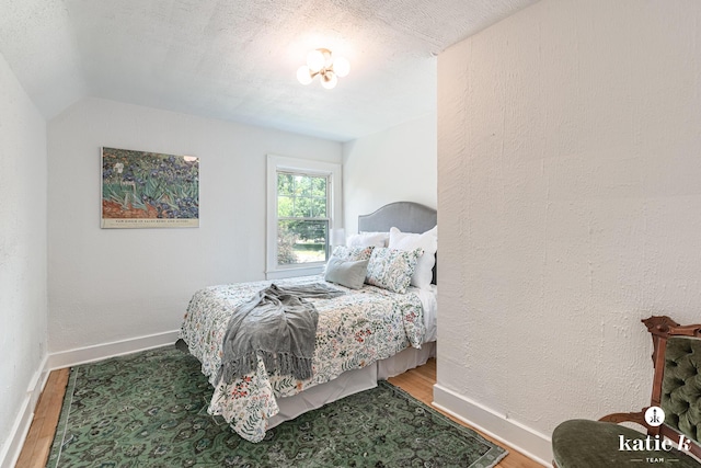 1002 Benjamin Ave SE, Grand Rapids, MI 49506 - bedroom with wood finished floors and baseboards