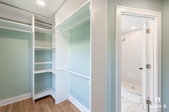 1002 Benjamin Ave SE, Grand Rapids, MI 49506 - spacious closet with wood finished floors