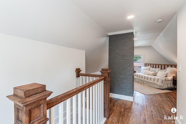 1002 Benjamin Ave SE, Grand Rapids, MI 49506 - corridor featuring wood-type flooring, an upstairs landing, lofted ceiling, and recessed lighting
