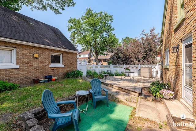 1002 Benjamin Ave SE, Grand Rapids, MI 49506 - view of patio with a wooden deck