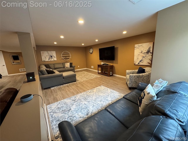 4020 Oak St, Grand Blanc, MI 48439 - living area with wood finished floors and recessed lighting