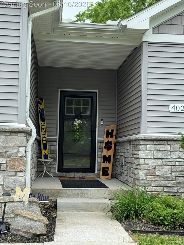 4020 Oak St, Grand Blanc, MI 48439 - property entrance with stone siding