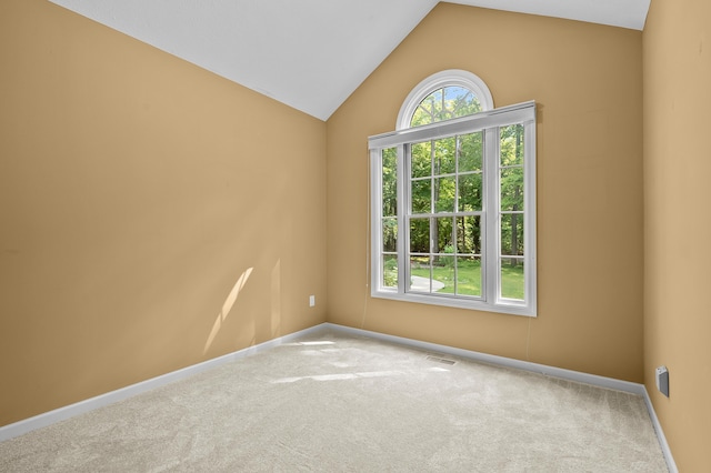 6916 Windsong Way, Kalamazoo, MI 49009 - carpeted empty room with vaulted ceiling and baseboards