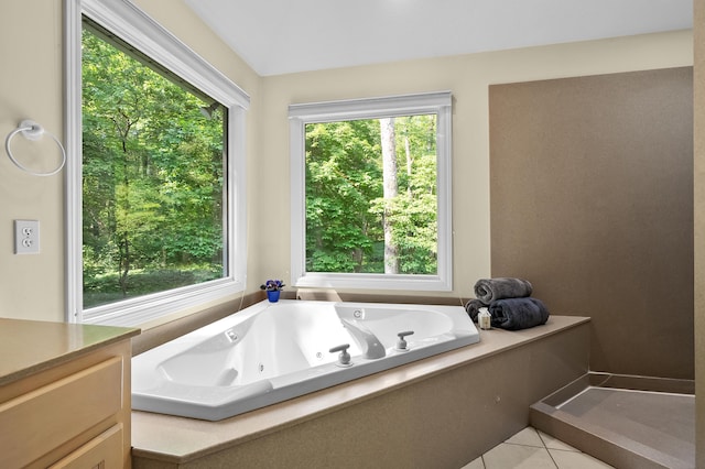 6916 Windsong Way, Kalamazoo, MI 49009 - full bath featuring a whirlpool tub, tile patterned flooring, and vanity