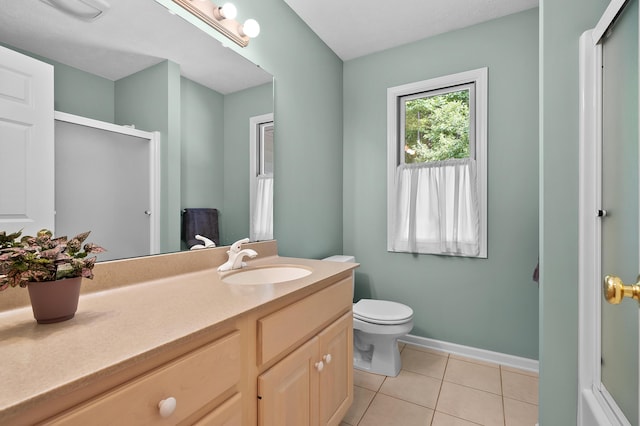 6916 Windsong Way, Kalamazoo, MI 49009 - bathroom featuring vanity, a shower with shower door, and tile patterned floors