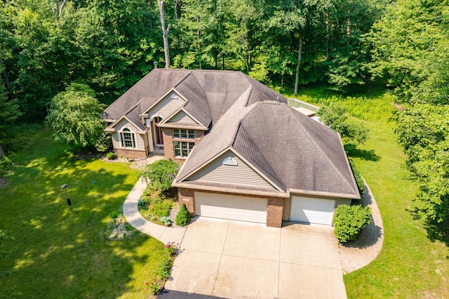 6916 Windsong Way, Kalamazoo, MI 49009 - view from above of property featuring a heavily wooded area