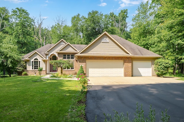 6916 Windsong Way, Kalamazoo, MI 49009 - view of front of property featuring brick siding, a garage, concrete driveway, and a front lawn