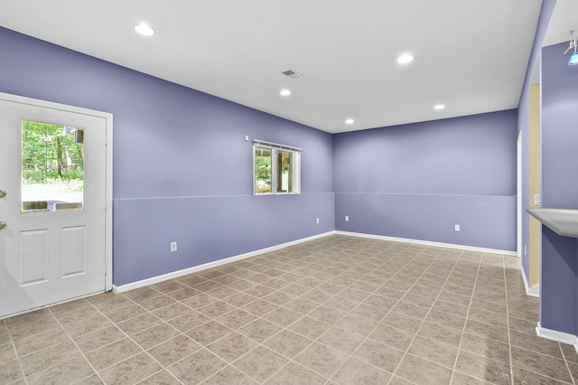 6916 Windsong Way, Kalamazoo, MI 49009 - unfurnished room featuring healthy amount of natural light and recessed lighting