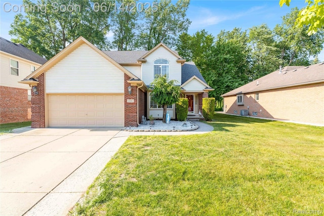 13563 Trotters Ln, Sterling Heights, MI 48313 - traditional home featuring a garage, driveway, brick siding, and a front lawn
