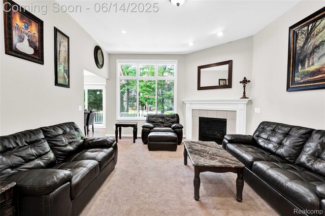 13563 Trotters Ln, Sterling Heights, MI 48313 - living room featuring carpet floors, a tile fireplace, and recessed lighting