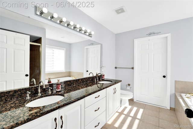 13563 Trotters Ln, Sterling Heights, MI 48313 - bathroom with double vanity, a garden tub, tile patterned flooring, and a tile shower