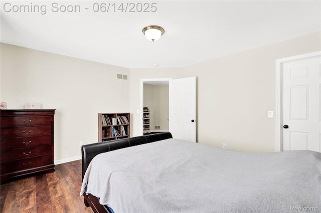 13563 Trotters Ln, Sterling Heights, MI 48313 - bedroom with dark wood-style floors and baseboards