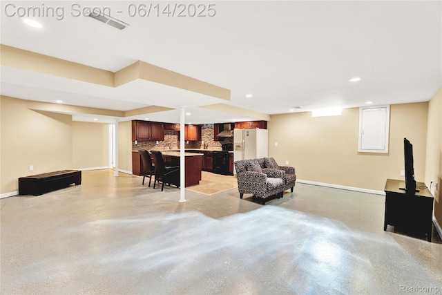 13563 Trotters Ln, Sterling Heights, MI 48313 - living room featuring recessed lighting, concrete floors, and bar with sink