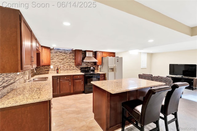 13563 Trotters Ln, Sterling Heights, MI 48313 - kitchen featuring black range with electric stovetop, white refrigerator with ice dispenser, wall chimney range hood, tasteful backsplash, and recessed lighting